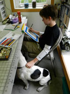 boy drawing with dog